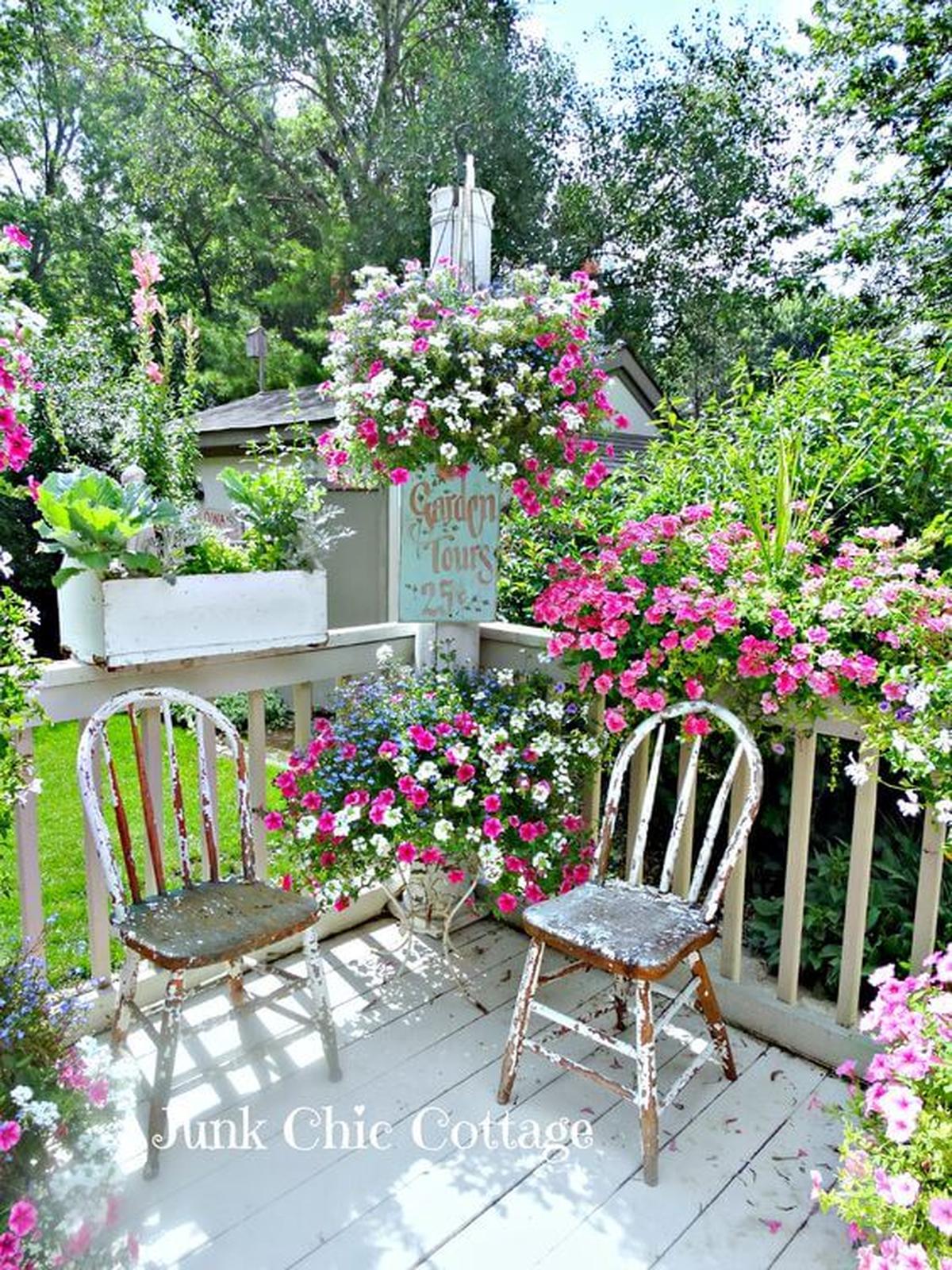 An Inviting Seating with Blooming Flower Baskets