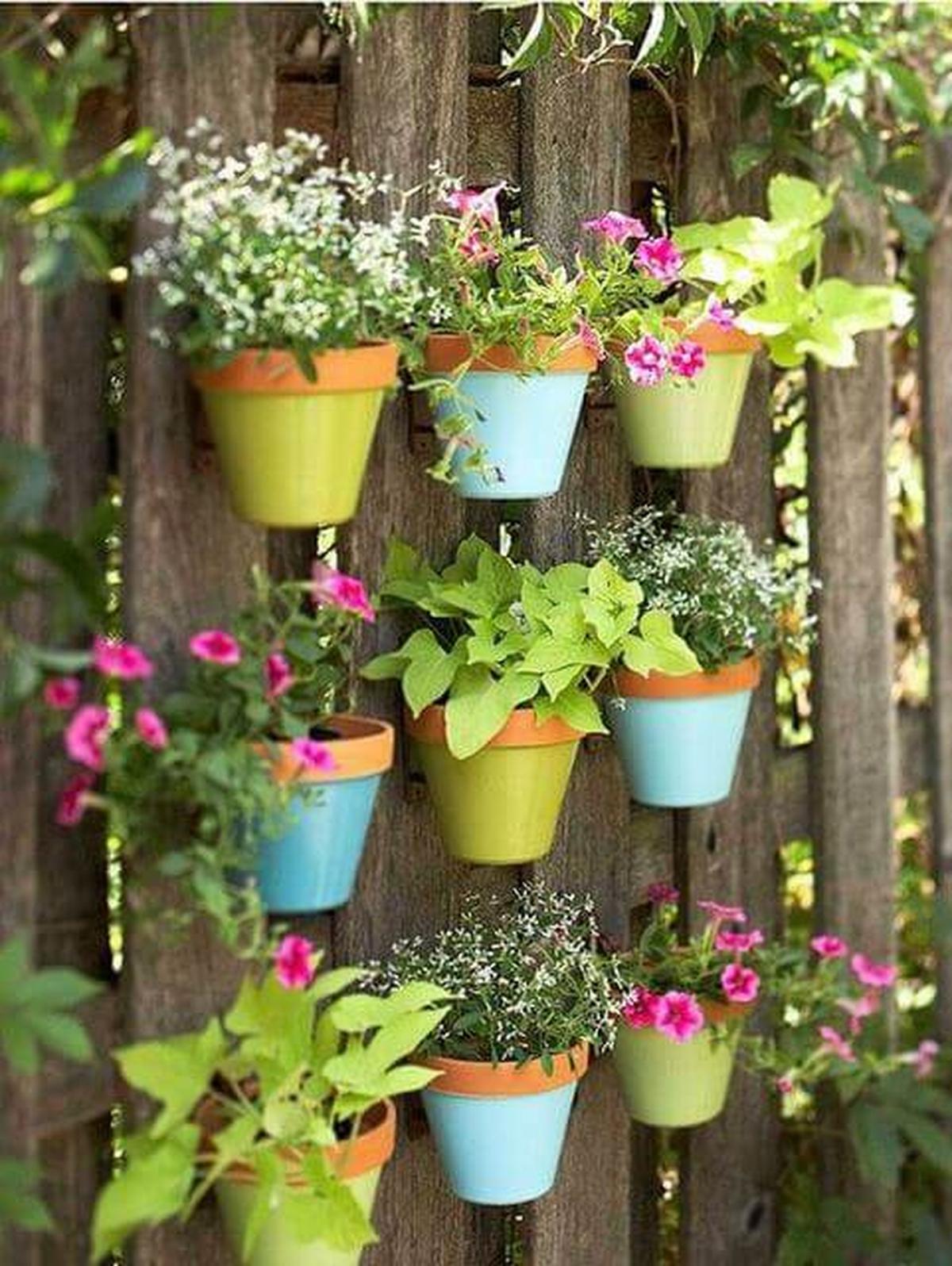 Terra Cotta Pot Garden on a Fence