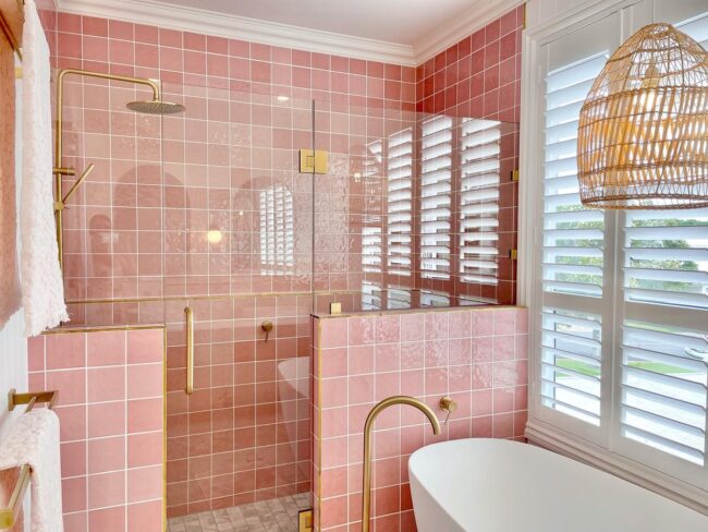Elegant Pink Shower Enhanced with Brass Fixtures